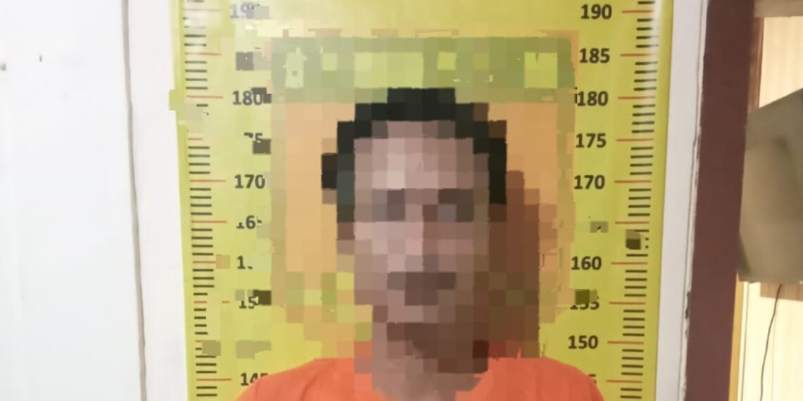 Tersangka saat diamankan di Polsek Kebomas