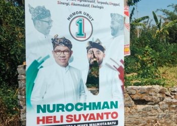 Sejumlah APK Poslon Nurochman – Heli Suyanto Dirusak, Tim Kuasa Hukum Menyusun Laporan ke Bawaslu Batu 