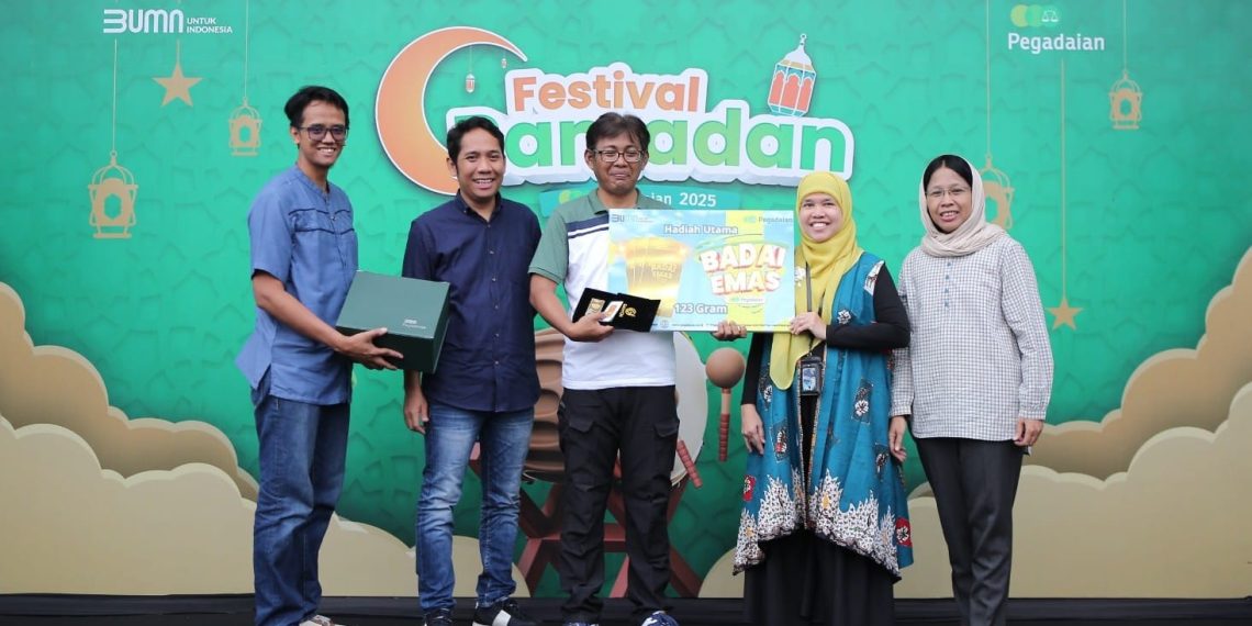 Muhammad Choirul Hanafi rebut hadiah utama logam mulia seberat 123 gram. (foto: ist)