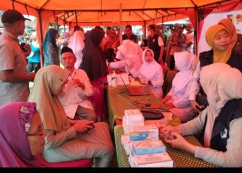 Saat Manisnya Senyuman Bertemu Terangnya Pandangan di Lokasi TMMD Kediri